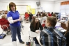 Susan Hey talks with students in her 8th-grade social studies class at Bloomfield Middle School (Nelson County). Hey requires assignments to be turned in written in cursive with ink.Photo by Amy Wallot, March 15, 2013