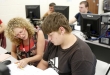 Lisa Herner helps Bullitt County Career Readiness Center (CRC) sophomore Dustin Deindoerfer with a history assignment. Photo by Amy Wallot, Sept. 5, 2012