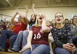 Seventh-grade students Sarah Fraley, Renae Lewis, Mica Easton and Kaitlyn Dierce cheer during the West Cater Middle School (Carter) Schools to Watch ceremony March 30, 2010. Photo by Amy Wallot