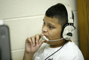 Seventh-grade student Walter Zeron practices Japanese using the Rosetta Stone program at North Middle School (Henderson County). Students in the foreign language lab choose from 25 different languages to learn. The most popular are Spanish and French. Photo by Amy Wallot, Sept. 9, 2011