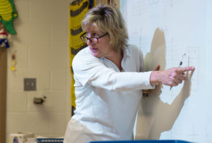 Pam Ollier, an 8th-grade math teacher at Gray Middle School (Boone), teaches a lesson over graphing. Gray Middle School became the seventh middle school since 1982 to be name a Blue Ribbon School in the state of Kentucky. Photo by Bobby Ellis, Jan. 24, 2017