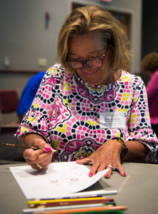 Christina Cornelius, a 5th-grade teacher at Farmer Elementary (Jefferson County), draws a political cartoon during Loureen Laumeyer's session. Photo by Bobby Ellis, July 13, 2017