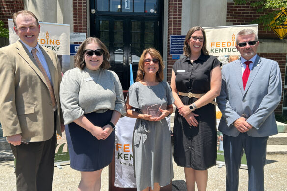 John Cain, Ashley Roudebush, Cathy Gallagher, Melissa McDonald and Robbie Fletcher pose for a photo