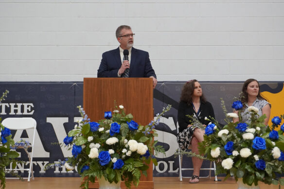 Todd Moody speaks behind a podium